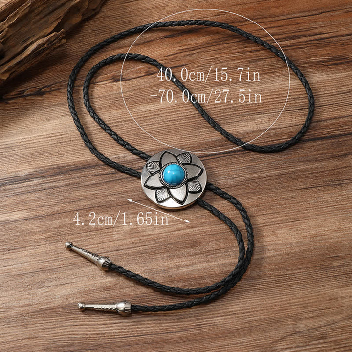 Oval Carved Petal Black Turquoise Stone Bolo Tie