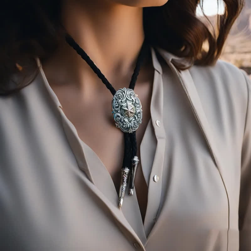 Western Texas Silver Star Carving Bolo Tie