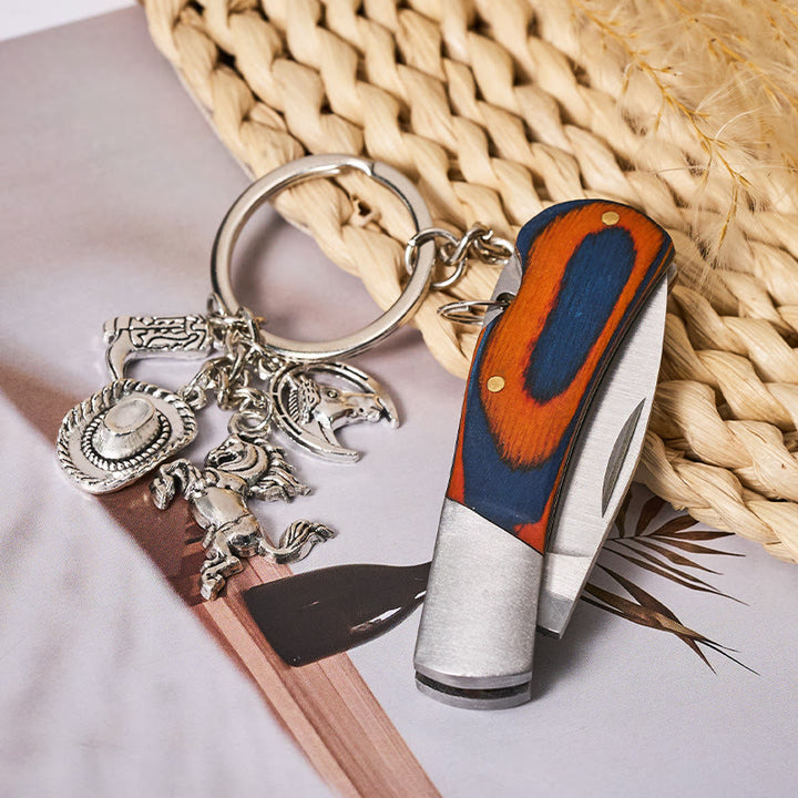 Wood Grain Folding Knife Silver Horse & Cowboy Hat Keychain - image 1