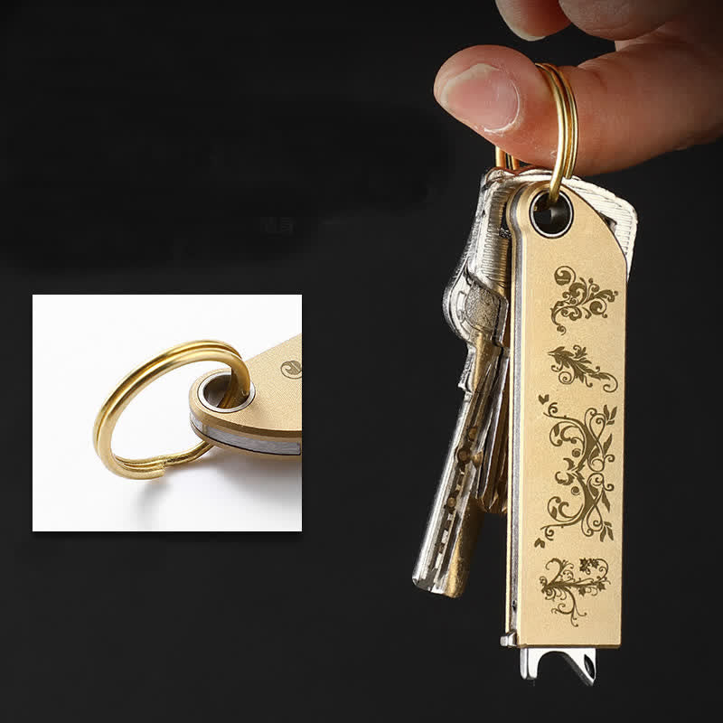 Compact Sleek Gold-Patterned Folding Brass Knife Keychain - image 1