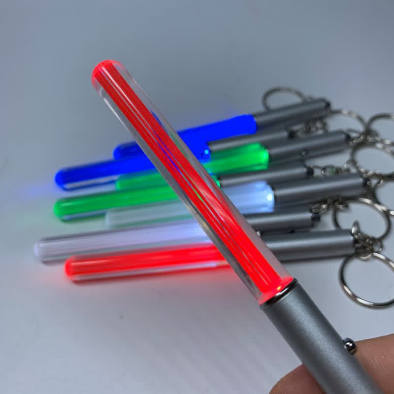 Novelty Mini Light Up LED Lightsaber Keychain - Red - image 1